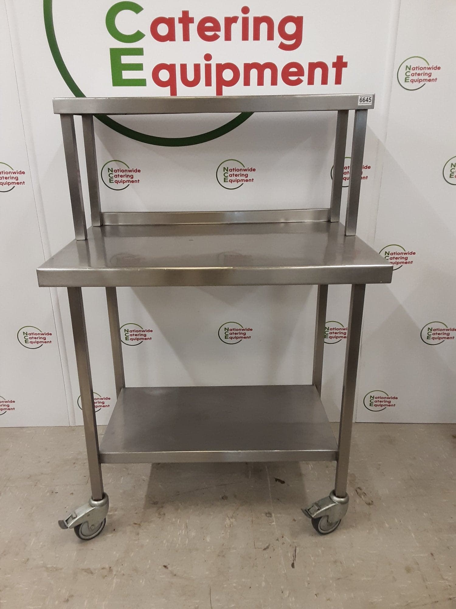 Stainless Steel Table On Wheels With Shelf Above